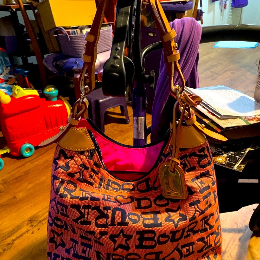 Dooney and Bourke vintage handbag Off red with purple name letters. C